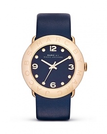 Give your hourly look a hit of MARC BY MARC JACOBS' style with this watch. Equal parts casual and cool, it features a leather strap and logo-engraved bezel. Give your hourly look a hit of MARC BY MARC JACOBS' style with this watch. Equal parts casual and cool, it features a leather strap and logo-engraved bezel.