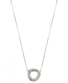 Swirling rings of crystal accents lend a mesmerizing touch to this pendant necklace from Anne Klein. Crafted in silver tone mixed metal. Approximate length: 16 inches + 2-inch extender. Approximate drop: 3/4 inch. Swirling rings of crystal accents lend a mesmerizing touch to this pendant necklace from Anne Klein. Crafted in silver tone mixed metal. Approximate length: 16 inches + 2-inch extender. Approximate drop: 3/4 inch.