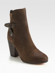 Textured nubuck pairs with smooth leather straps in this trend-smart ankle boot with a commanding heel. Stacked heel, 3¾ (95mm)Nubuck leather upper with leather trimAdjustable leather strap with metal pull-tab closureLeather lining and solePadded insoleImported Textured nubuck pairs with smooth leather straps in this trend-smart ankle boot with a commanding heel. Stacked heel, 3¾ (95mm)Nubuck leather upper with leather trimAdjustable leather strap with metal pull-tab closureLeather lining and solePadded insoleImported