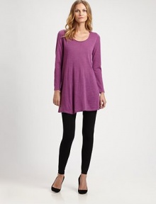 Offering a more elongated silhouette, a brilliant merino wool tunic with a feminine neckline. ScoopneckLong sleevesPull-on styleAbout 33 from shoulder to hemMerino woolDry cleanImported of Italian fabric Model shown is 5'10½ (179cm) wearing US size Small. Offering a more elongated silhouette, a brilliant merino wool tunic with a feminine neckline. ScoopneckLong sleevesPull-on styleAbout 33 from shoulder to hemMerino woolDry cleanImported of Italian fabric Model shown is 5'10½ (179cm) wearing US size Small.