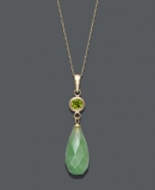 Serene and stylish. This tranquil pendant features a faceted jade teardrop (18 mm x 8 mm) accented by a sparkling, round-cut peridot (1 ct. t.w.). Setting and chain crafted in 14k gold. Approximate length: 18 inches. Approximate drop: 1-1/4 inches. Serene and stylish. This tranquil pendant features a faceted jade teardrop (18 mm x 8 mm) accented by a sparkling, round-cut peridot (1 ct. t.w.). Setting and chain crafted in 14k gold. Approximate length: 18 inches. Approximate drop: 1-1/4 inches.