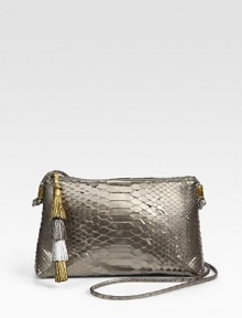 Luxe python takes on a metallic sheen in this sleek zip-top bag finished with an oversized tiered tassel.Shoulder strap, 26½ dropTop zip closureOne outside open back pocketOne inside zip pocketSuede lining10W X 7H X 2DMade in USA Luxe python takes on a metallic sheen in this sleek zip-top bag finished with an oversized tiered tassel.Shoulder strap, 26½ dropTop zip closureOne outside open back pocketOne inside zip pocketSuede lining10W X 7H X 2DMade in USA