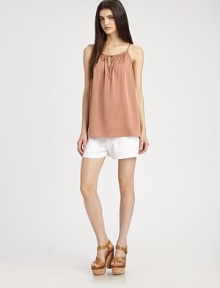 A softly draped silhouette of pure silk, with an unexpected keyhole for a casual-cool look. ScoopneckThin spaghetti strapsFront keyhole with self-tieRuching for added drapeHigh-low hem95% silk/5% spandexDry cleanImportedModel shown is 5'10 (177cm) wearing US size Small. A softly draped silhouette of pure silk, with an unexpected keyhole for a casual-cool look. ScoopneckThin spaghetti strapsFront keyhole with self-tieRuching for added drapeHigh-low hem95% silk/5% spandexDry cleanImportedModel shown is 5'10 (177cm) wearing US size Small.