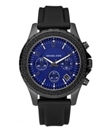 A sport watch with edgy sparkle, by Michael Kors. Black silicone strap and round black ion-plated stainless steel case. Bezel crystallized with jet black Swarovski elements. Glossy blue opaline dial features numerals and stick indices, crystal accents at markers, date window, three subdials, luminous hands and logo. Quartz movement. Water resistant to 100 meters. Two-year limited warranty. A sport watch with edgy sparkle, by Michael Kors. Black silicone strap and round black ion-plated stainless steel case. Bezel crystallized with jet black Swarovski elements. Glossy blue opaline dial features numerals and stick indices, crystal accents at markers, date window, three subdials, luminous hands and logo. Quartz movement. Water resistant to 100 meters. Two-year limited warranty.
