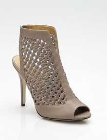 The daring mix of chained leather and cutouts demands attention.Self-covered heel, 4½ (115mm) Open toe Back elastic Pull-on style Leather lining and sole Padded insole ImportedOUR FIT MODEL RECOMMENDS ordering true size. The daring mix of chained leather and cutouts demands attention.Self-covered heel, 4½ (115mm) Open toe Back elastic Pull-on style Leather lining and sole Padded insole ImportedOUR FIT MODEL RECOMMENDS ordering true size.