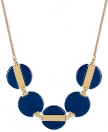 Feeling blue? Let this striking necklace cheer you up! Blue beaded circles create a unique effect on Kenneth Cole New York's frontal design. Set in gold tone mixed metal. Approximate length: 17 inches + 3-inch extender. Approximate drop: 1 inch. Feeling blue? Let this striking necklace cheer you up! Blue beaded circles create a unique effect on Kenneth Cole New York's frontal design. Set in gold tone mixed metal. Approximate length: 17 inches + 3-inch extender. Approximate drop: 1 inch.