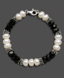Take a classic cultured freshwater pearl bracelet (8-9 mm) to the dark side with the addition of faceted black onyx (8 mm). Bracelet crafted in sterling silver. Approximate length: 7-1/2 inches. Take a classic cultured freshwater pearl bracelet (8-9 mm) to the dark side with the addition of faceted black onyx (8 mm). Bracelet crafted in sterling silver. Approximate length: 7-1/2 inches.