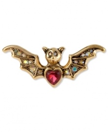 Take a bite out of the night with this chic stretch ring from Betsey Johnson. The bat wing design is adorned with crystal accents, a pink crystal heart and a gold tone segmented body. Stretches to fit finger. Crafted in antiqued gold tone mixed metal. Size 7-1/2. Take a bite out of the night with this chic stretch ring from Betsey Johnson. The bat wing design is adorned with crystal accents, a pink crystal heart and a gold tone segmented body. Stretches to fit finger. Crafted in antiqued gold tone mixed metal. Size 7-1/2.