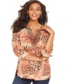 Take a walk on the wild side with Charter Club's three-quarter sleeve plus size top, highlighted by bold animal print!