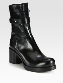 A stacked platform and heel heighten this seasonal favorite in butter-soft Italian leather. Stacked heel, 2½ (65mm)Stacked platform, ¾ (20mm)Compares to a 1¾ heel (45mm)Shaft, 7¾Leg circumference, 10Leather upperSide zip and strap with metal pull-tab closureLeather lining and solePadded insoleMade in Italy A stacked platform and heel heighten this seasonal favorite in butter-soft Italian leather. Stacked heel, 2½ (65mm)Stacked platform, ¾ (20mm)Compares to a 1¾ heel (45mm)Shaft, 7¾Leg circumference, 10Leather upperSide zip and strap with metal pull-tab closureLeather lining and solePadded insoleMade in Italy