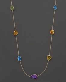 Let your true colors shine. This multi gem station necklace blends topaz, amethyst and other polished stones with 14 kt. yellow gold. Let your true colors shine. This multi gem station necklace blends topaz, amethyst and other polished stones with 14 kt. yellow gold.