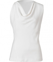 Lend a contemporary edge to polished day and evening looks alike with Donna Karans pristine white sculptural top - Draped neckline, asymmetrical sleeveless top - Form-fitting - Wear with a bright skirt, a blazer and pin heels Lend a contemporary edge to polished day and evening looks alike with Donna Karans pristine white sculptural top - Draped neckline, asymmetrical sleeveless top - Form-fitting - Wear with a bright skirt, a blazer and pin heels