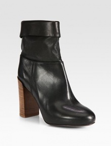 Crafted with a fold-over cuff and hidden platform, this is a modern take on the slouchy classic.Stacked heel, 3¾ (95mm)Hidden platform, ¾ (20mm)Compares to a 3 heel (75mm)Leather upperLeather lining and solePadded insoleMade in ItalyThis style runs true to size. We recommend ordering your usual size for a standard fit. Crafted with a fold-over cuff and hidden platform, this is a modern take on the slouchy classic.Stacked heel, 3¾ (95mm)Hidden platform, ¾ (20mm)Compares to a 3 heel (75mm)Leather upperLeather lining and solePadded insoleMade in ItalyThis style runs true to size. We recommend ordering your usual size for a standard fit.