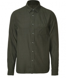 Rugged looks get a cool finish in Woolrichs green plaid flanel button-down - Classic cut, buttoned cuffs, breast pocket, shirttail hemline - Team with jeans and rugged boots Rugged looks get a cool finish in Woolrichs green plaid flanel button-down - Classic cut, buttoned cuffs, breast pocket, shirttail hemline - Team with jeans and rugged boots