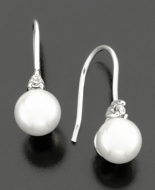 Delicate glass pearl earrings (6 mm) with a touch of cubic zirconia from Lauren Ralph Lauren are a year-round must-have. Silver-plated posts. Delicate glass pearl earrings (6 mm) with a touch of cubic zirconia from Lauren Ralph Lauren are a year-round must-have. Silver-plated posts.