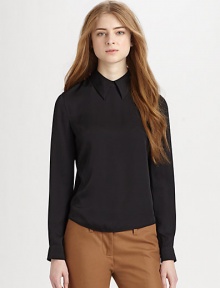 Buttery silk fabric with a hint of stretch forms this impeccably-tailored design. High point collarLong sleeves with button cuffsBack zip closureU-shaped hemAbout 22 from shoulder to hem92% silk/8% elastaneDry cleanImportedModel shown is 5'10 (177cm) wearing US size 4. Buttery silk fabric with a hint of stretch forms this impeccably-tailored design. High point collarLong sleeves with button cuffsBack zip closureU-shaped hemAbout 22 from shoulder to hem92% silk/8% elastaneDry cleanImportedModel shown is 5'10 (177cm) wearing US size 4.