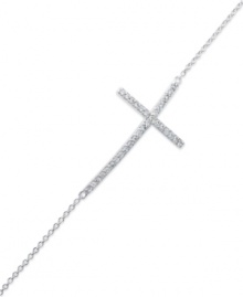 A stunning testament. This bracelet features a sideways cross with cubic zirconia accents adding a lustrous touch. Crafted from sterling silver. Approximate length: 7-1/2 inches. Approximate cross size: 1-3/8 inches x 3/4 inch. A stunning testament. This bracelet features a sideways cross with cubic zirconia accents adding a lustrous touch. Crafted from sterling silver. Approximate length: 7-1/2 inches. Approximate cross size: 1-3/8 inches x 3/4 inch.