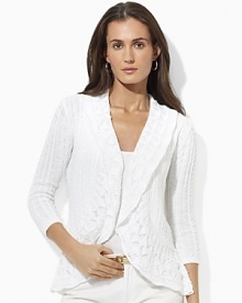 The definition of chic heritage, the Velika cardigan is crafted in a softly draped shawl-collar silhouette from delicately pointelle-knit slub cotton.