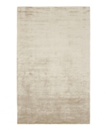 Presenting a solid, silvery hue in soft viscose, the Beckett area rug from Lauren Ralph Lauren offers a chic ground ripe for enhancing any modern setting. Durable enough to withstand heavy indoor traffic, yet luxuriously soft underfoot. Presenting a solid, silvery hue in soft viscose, the Beckett area rug from Lauren Ralph Lauren offers a chic ground ripe for enhancing any modern setting. Durable enough to withstand heavy indoor traffic, yet luxuriously soft underfoot.