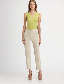 The ideal wardrobe staple, in soft, finespun stretch cotton.V neckline with crossover detailSleevelessCotton/elastaneDry cleanImported of Swiss fabricModel shown is 5'10 (177cm) wearing US size 4. The ideal wardrobe staple, in soft, finespun stretch cotton.V neckline with crossover detailSleevelessCotton/elastaneDry cleanImported of Swiss fabricModel shown is 5'10 (177cm) wearing US size 4.