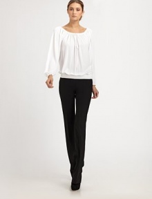 This ultra-flattering blouson style can be worn on or off the shoulder, thanks to an adjustable drawstring neckline.Drawstring portrait neckline with front self tieLong blouson sleeves with gathered cuffsSmocked, elastic hemlineViscoseDry cleanImported of Italian fabricModel shown is 5'11 (180cm) wearing US size 4. This ultra-flattering blouson style can be worn on or off the shoulder, thanks to an adjustable drawstring neckline.Drawstring portrait neckline with front self tieLong blouson sleeves with gathered cuffsSmocked, elastic hemlineViscoseDry cleanImported of Italian fabricModel shown is 5'11 (180cm) wearing US size 4.