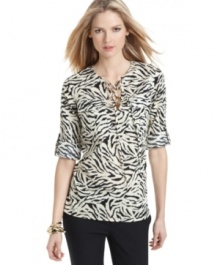 Add safari style to your spring wardrobe with this MICHAEL Michael Kors animal-printed blouse! Add safari style to your spring wardrobe with this MICHAEL Michael Kors animal-printed blouse!