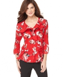 Floral and flirty, NY Collection's top adds a unique twist to your wardrobe with elegant ruffles and a drawstring waist. The pleated fabric gives it a textural touch. Floral and flirty, NY Collection's top adds a unique twist to your wardrobe with elegant ruffles and a drawstring waist. The pleated fabric gives it a textural touch.