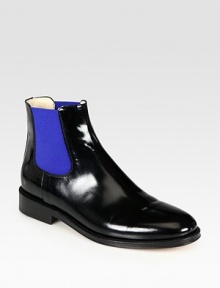 Glazed leather in an ankle-grazing design with comfortable elastic side gores for a tailored fit. Stacked heel, 1 (25mm)Leather and elastic upperLeather lining and solePadded insoleMade in Italy Glazed leather in an ankle-grazing design with comfortable elastic side gores for a tailored fit. Stacked heel, 1 (25mm)Leather and elastic upperLeather lining and solePadded insoleMade in Italy