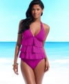 Cheers for tiers! Three rows of pretty tiers create a fluid and oh-so flattering look on this halter swim top from Kenneth Cole Reaction.