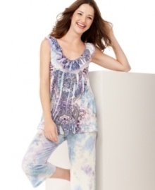 Ruffle detail and a charming print puts a whimsical spin on this adorable pajama set from One World. Ruffle detail and a charming print puts a whimsical spin on this adorable pajama set from One World.