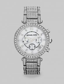 Unabashed dazzle defines this striking chronograph, a clever combination of high fashion and high tech.Quartz movementWater resistant to 5 ATMSilvertone stainless steel round case, 39mm diameter (1.5)Crystal bezelLight silvertobe dialSilvertone 12 and crystal hour markersSecond handThree chronograph sub dialsDate window between 4:00 and 5:00Crystal-set link braceletImported Unabashed dazzle defines this striking chronograph, a clever combination of high fashion and high tech.Quartz movementWater resistant to 5 ATMSilvertone stainless steel round case, 39mm diameter (1.5)Crystal bezelLight silvertobe dialSilvertone 12 and crystal hour markersSecond handThree chronograph sub dialsDate window between 4:00 and 5:00Crystal-set link braceletImported