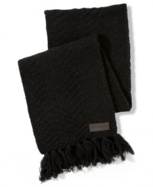 Tommy Hilfiger knits up a thick, sturdy yarn into a hefty, herringbone texture to create this season's essential accessory. Tommy Hilfiger knits up a thick, sturdy yarn into a hefty, herringbone texture to create this season's essential accessory.