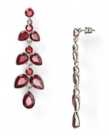 This pair of ABS by Allen Schwartz earrings interprets the floral motif in glamorous style, crafted of plated metal with radiant stone petals. This pair of ABS by Allen Schwartz earrings interprets the floral motif in glamorous style, crafted of plated metal with radiant stone petals.