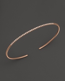 A simply modern diamond bangle in 14K rose gold from Meira T. A simply modern diamond bangle in 14K rose gold from Meira T.
