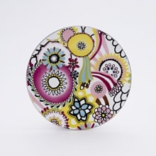 From the fashion house of Missoni, Margherita bone china is decorated with multicolor kaleidoscopic flowers. From the fashion house of Missoni, Margherita bone china is decorated with multicolor kaleidoscopic flowers.