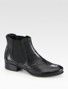 On-trend leather staple with elasticized gores for convenient on and off access. Self-covered heel, 1¼ (30mm)Leather upper with side elastic goresPull-on styleLeather lining and solePadded insoleImported On-trend leather staple with elasticized gores for convenient on and off access. Self-covered heel, 1¼ (30mm)Leather upper with side elastic goresPull-on styleLeather lining and solePadded insoleImported