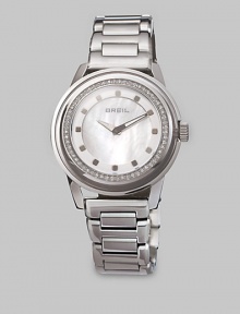 From the Orchestra Collection. A beautiful timepiece in sleek stainless steel with a dazzling Swarovski crystal bezel. Quartz movementWater resistant to 10 ATMRound stainless steelcase, 40mm (1.5) Swarovski crystal accented bezelMother-of-pearl dialDot markersStainless steel link braceletImported From the Orchestra Collection. A beautiful timepiece in sleek stainless steel with a dazzling Swarovski crystal bezel. Quartz movementWater resistant to 10 ATMRound stainless steelcase, 40mm (1.5) Swarovski crystal accented bezelMother-of-pearl dialDot markersStainless steel link braceletImported