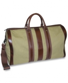 Travel in style with this classic and very chic durable canvas duffle bag with leather trim by Dopp. Travel in style with this classic and very chic durable canvas duffle bag with leather trim by Dopp.