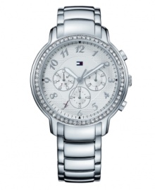 Smooth steel and etched patterns play off one another in this design by Tommy Hilfiger. Watch features stainless steel bracelet and round case. Bezel embellished with Swarovski elements. Etched silvertone dial features numerals, luminous hands, logo and three subdials. Quartz movement. Water resistant to 50 meters. Ten-year limited warranty. Smooth steel and etched patterns play off one another in this design by Tommy Hilfiger. Watch features stainless steel bracelet and round case. Bezel embellished with Swarovski elements. Etched silvertone dial features numerals, luminous hands, logo and three subdials. Quartz movement. Water resistant to 50 meters. Ten-year limited warranty.