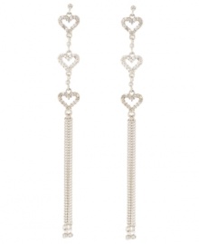 Follow your heart. A shimmering trio of crystal hearts sets apart these long, linear drop earrings from Betsey Johnson. Set in silver tone mixed metal with a chic multi chain silhouette, they'll add just the right amount of glitz and glamour to your going-out wardrobe. Approximate drop: 4-3/4 inches. Follow your heart. A shimmering trio of crystal hearts sets apart these long, linear drop earrings from Betsey Johnson. Set in silver tone mixed metal with a chic multi chain silhouette, they'll add just the right amount of glitz and glamour to your going-out wardrobe. Approximate drop: 4-3/4 inches.