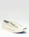 A chic, classic slip-on design of trusty canvas and rubber.Rubber toe cap Padded insole Rubber sole Imported