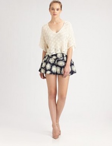 Crocheted to perfection, this sweetly sophisticated dolman top has a honeycomb-inspired pattern and abbreviated silhouette. V-neckDropped shouldersElbow-length dolman sleevesCropped hemViscoseDry cleanMade in USA of Italian fabricSIZE & FITModel shown is 5'10 (177cm) wearing US size 4. Crocheted to perfection, this sweetly sophisticated dolman top has a honeycomb-inspired pattern and abbreviated silhouette. V-neckDropped shouldersElbow-length dolman sleevesCropped hemViscoseDry cleanMade in USA of Italian fabricSIZE & FITModel shown is 5'10 (177cm) wearing US size 4.