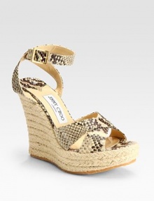 Snake-printed leather straps and an espadrille wedge says safari chic. Wedge heel, 5 (125mm) Platform, 1½ (40mm) Adjustable ankle strap Leather lining Rubber sole Made in ItalyOUR FIT MODEL RECOMMENDS ordering true whole size; ½ sizes should order the next whole size up. Snake-printed leather straps and an espadrille wedge says safari chic. Wedge heel, 5 (125mm) Platform, 1½ (40mm) Adjustable ankle strap Leather lining Rubber sole Made in ItalyOUR FIT MODEL RECOMMENDS ordering true whole size; ½ sizes should order the next whole size up.