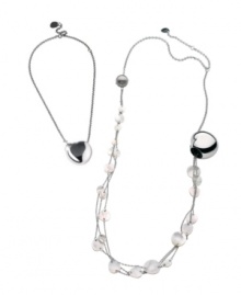 Two elegant looks combine into one chic style. Breil's versatile necklace can be worn as a single heart pendant, or as a long necklace accented by shimmering Mother of Pearl charms. Crafted in polished stainless steel. Approximate length: 14 inches + 4-inch extender. Approximate drop: 1-1/10 inches. Two elegant looks combine into one chic style. Breil's versatile necklace can be worn as a single heart pendant, or as a long necklace accented by shimmering Mother of Pearl charms. Crafted in polished stainless steel. Approximate length: 14 inches + 4-inch extender. Approximate drop: 1-1/10 inches.