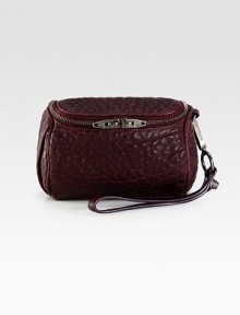 Luxurious textured leather with a convenient wrist strap.Wrist strap, 6½ dropTop zip closureFully lined6W X 4H X 4DImported Luxurious textured leather with a convenient wrist strap.Wrist strap, 6½ dropTop zip closureFully lined6W X 4H X 4DImported