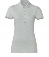 Burberry Brit updates the classic polo shirt with feminine puckered sleeves and a flattering slim fit - Spread collar, short puckered sleeves, front button half placket, logo at chest, slim fit, long body - Style with skinny jeans, denim shorts, modern chinos, or corduroys