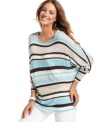 Stripes on a slouchy silhouette lend laid-back chic to Kut from the Kloth's top.