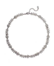 Spring is in full bloom every time you wear this elegant piece. Monet necklace features blossoms crafted from white glass pearls and sparkling crystal accents. Set in silver tone mixed metal. Approximate length: 16 inches + 2-inch extender. Spring is in full bloom every time you wear this elegant piece. Monet necklace features blossoms crafted from white glass pearls and sparkling crystal accents. Set in silver tone mixed metal. Approximate length: 16 inches + 2-inch extender.