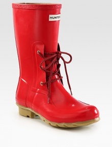 Stay dry with this rainy weather essential made of super-protective rubber, topped off with laces in a contrasting tone. Shaft, 10¼Leg circumference, 14Rubber upperPull-on styleNylon liningRubber solePadded insoleImported Stay dry with this rainy weather essential made of super-protective rubber, topped off with laces in a contrasting tone. Shaft, 10¼Leg circumference, 14Rubber upperPull-on styleNylon liningRubber solePadded insoleImported