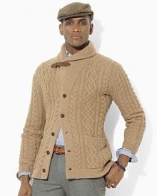 The pinnacle of relaxed refinement, a long-sleeved shawl cardigan is cable-knit from luxurious camel hair with supple leather detailing. The pinnacle of relaxed refinement, a long-sleeved shawl cardigan is cable-knit from luxurious camel hair with supple leather detailing.
